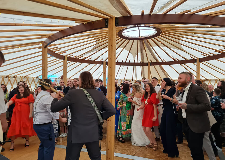 Wedding band playing in a yurt